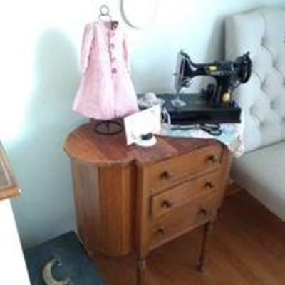 Singer feather weight and sewing cabinet