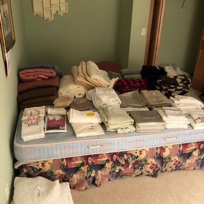 Lots of bedding, primarily queen but some twin/full; wool blankets, pillows; towels