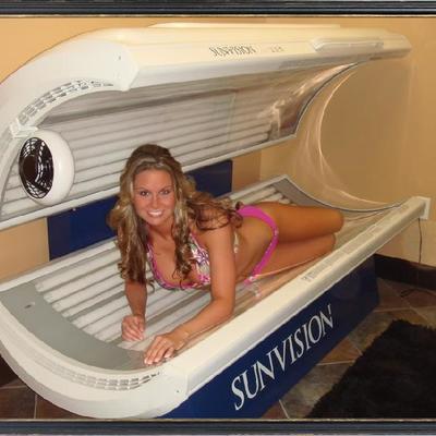 Sunvision Elite - Level 2 ( 20 minute bed with 3 facial lamps and fan)   - model 32sv3f  commercial grade tanning bed by Wolff 