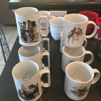 2 Different sets of 4 Norman Rockwell Mugs