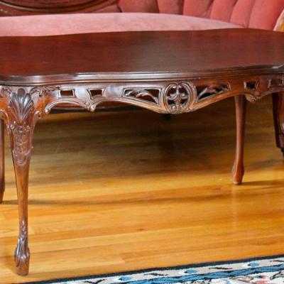 carved wood coffee table