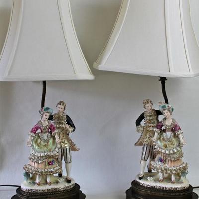 pair of hand-painted porcelain figurine lamps