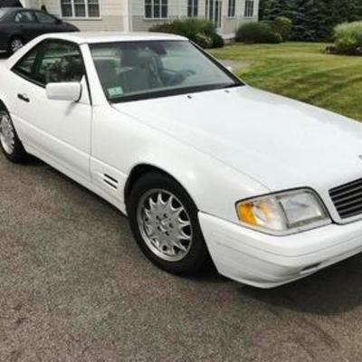 1998 Mercedes 500SL 2-door convertible, white with tan interior. Mileage 69,000. VIN WDBFA67F6WF168041.