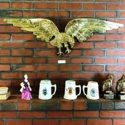 Mantle lot including brass eagle, owl bookends, 3 steins, Royal Doulton figurine