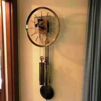 Howard Miller weight-driven brass wall clock