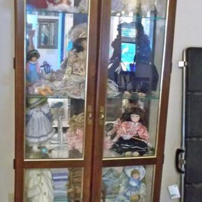 Lighted glass curio cabinet $265