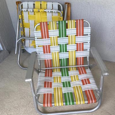 Vintage Folding Beach Chairs (webbing broken on yellow/white one in background)