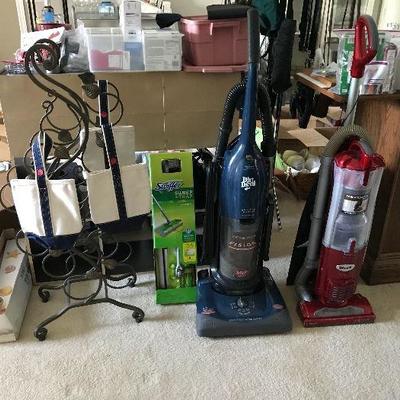 Wine rack, wine bottle bags (hold 2 750ml bottles per bag), 2 vacuums (red one includes pet attachments)
