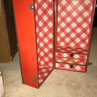 Vintage metal doll trunk with mini clothing hangers in the drawers.  Circa 1963. $55