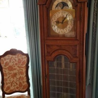 Old Grandfather Clock with leaded glass front
