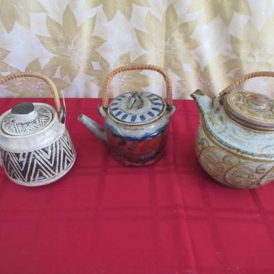 Pottery and other unique tea pots and decor