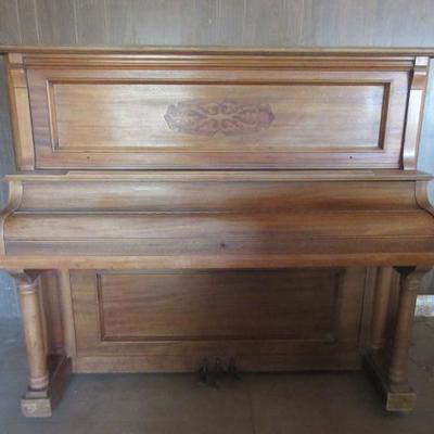 Antique upright grand piano
