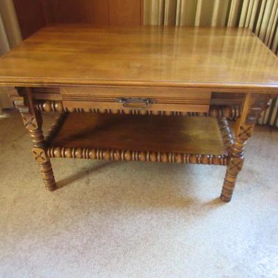 Gorgeous and ornate side serving table with twisted or spiral braces