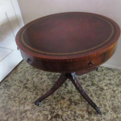 Vintage mahogany with leather inset on top circular entry way table