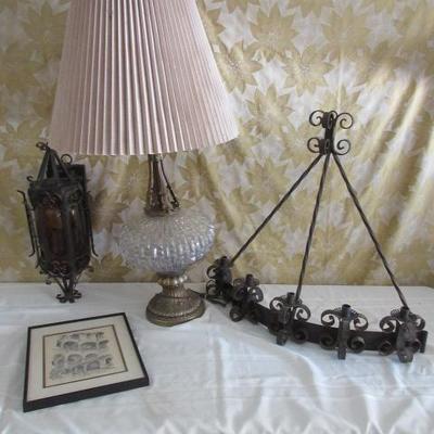 Wrought iron candle stick wall hanging, and a vintage crystal and brass lamp