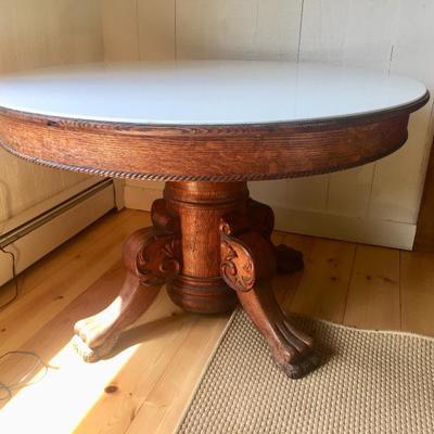 Antique Oak Claw Foot Table 46 round with  custom cut milk glass top.