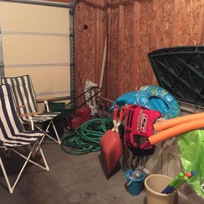 Garage patio/beach chairs, Hoses, Lawn Spreader, Pool/beach toys, child