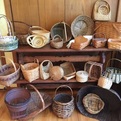 Over 30 baskets, all sizes, many handmade including Longaberger and "Sweetgrass" from Charleston SC plus vintage Picnic Baskets