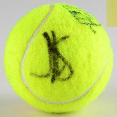A hand signed tennis ball by Maria Sharapova | Sharapova signed a Western & Southern Open tennis ball with a black marker | The signature...