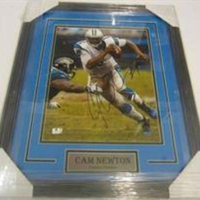 Signed Cam Newton poster, quarterback for the Carolina Panthers.