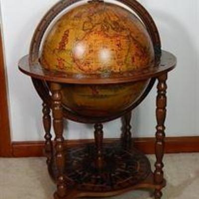 Antique globe with bar located inside