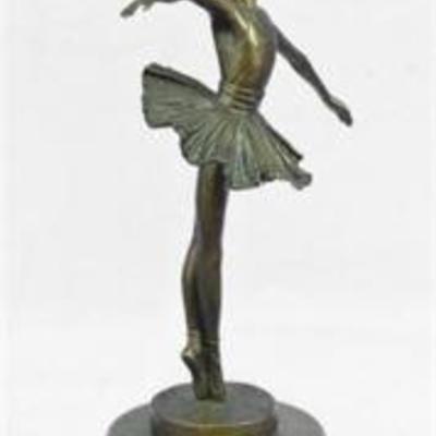 Bronze statue of a young ballerina mid twirl