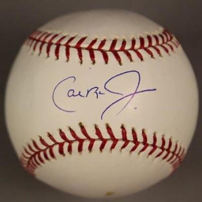 2.75â€³ x 2.75â€³ | Carl Ripken Jr. | Official MLB Baseball | Autographed
An autographed Cal Ripken Jr. Official MLB baseball signed on...