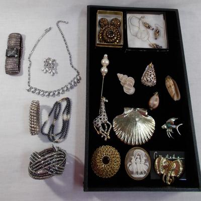 sets, pins, bracelets, and pendants