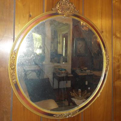 Round antique mirror $120
27 X 24"