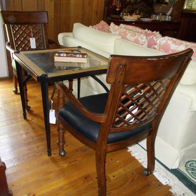 Glass top table $195
28 X 28 X 27 1/2"
Black leather chair $150
2 available
23 X 22 X 38
