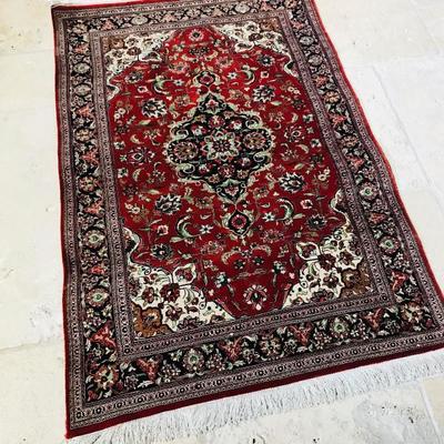 Hand woven SILK area rug from Iran. 45" x 30". $450.