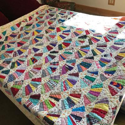 Hand stitched quilt. 88" x 76". Fan shaped pattern. $275