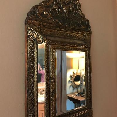 Decorative tin and wood mirror with shoe brushes inside. $100