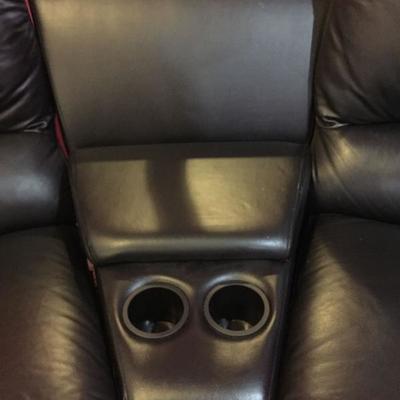 4 seat leather sectional sofa w/2 consoles.