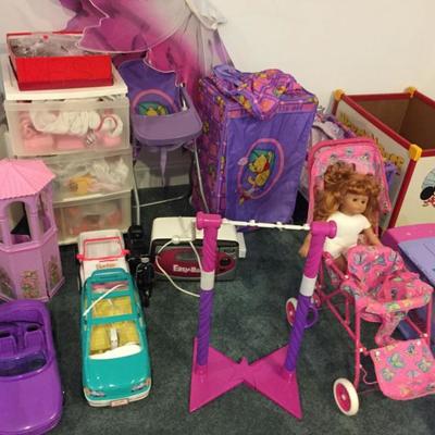 Barbie cars, jeep, minivan, baby doll high chair, double doll stroller, bus and Mickey Mouse toy chests.