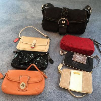 Designer Coach purses and handbags.