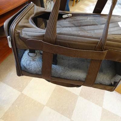 Dog bag carrier.
