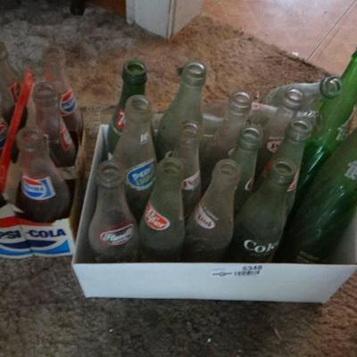 Lot of old pop bottles.
