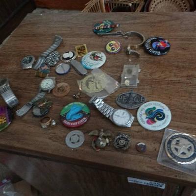 Lot of watches and shirt pins.