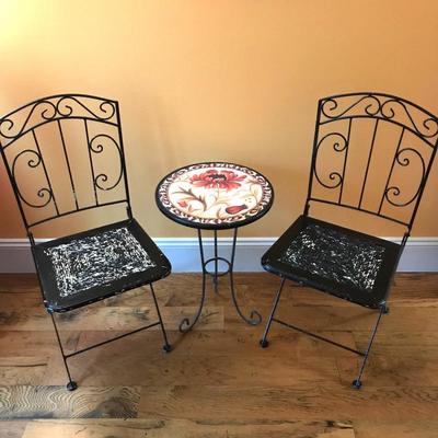 Hand painted bistro table and folding chairs.