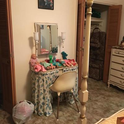 Dressing table with lighted mirror