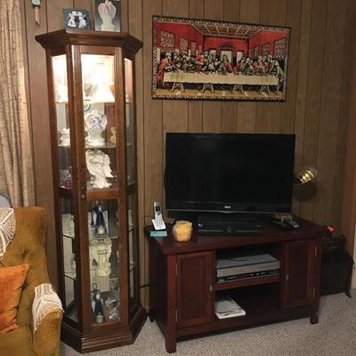 Lighted display cabinet, tv stand, tv, vhs/dvd player