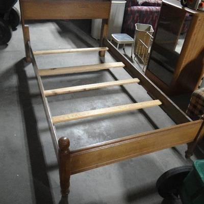 Twin size wooden bed frame.