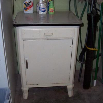 Old metal cabinet with granite top