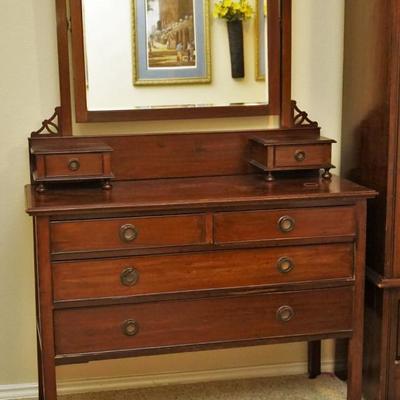 Early 1900's solid mahongany dresser good old original finish well fitted with small drawers and mirror $325 