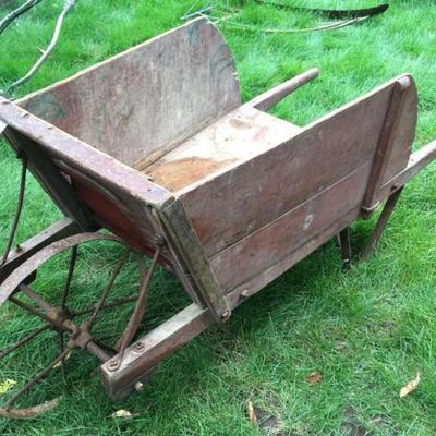 Antique steel wheelbarrow