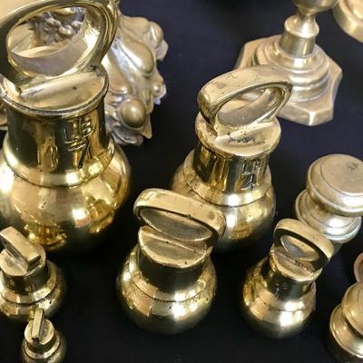 Brass bells sold and some candlesticks 