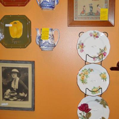 floral plates, framed photo, wall pockets, etc.