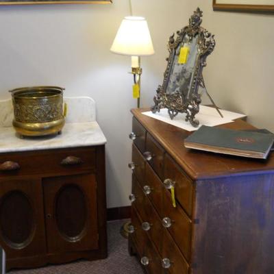 Mid 1800's silver easel mirror, vintage marble top washstand, brass handled pot, dresser with glass pulls, etc.