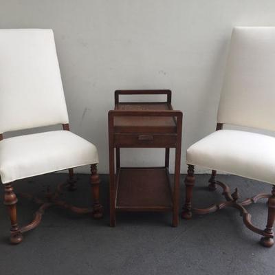 Two formal accent chairs and side table